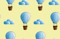 Seamless pattern with cartoon aerostat and clouds on a yellow background. Blue balloon. Creative kids texture for fabric, wrapping